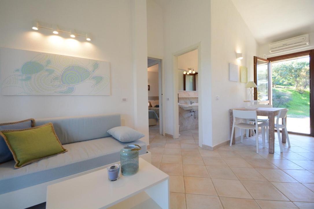 Case Sul Mare Residenze Di Bes Chia Exterior photo