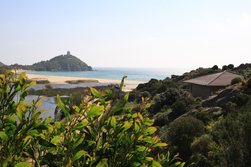 Case Sul Mare Residenze Di Bes Chia Exterior photo